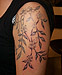 Tattoo Pflanzenranke mit Blüten